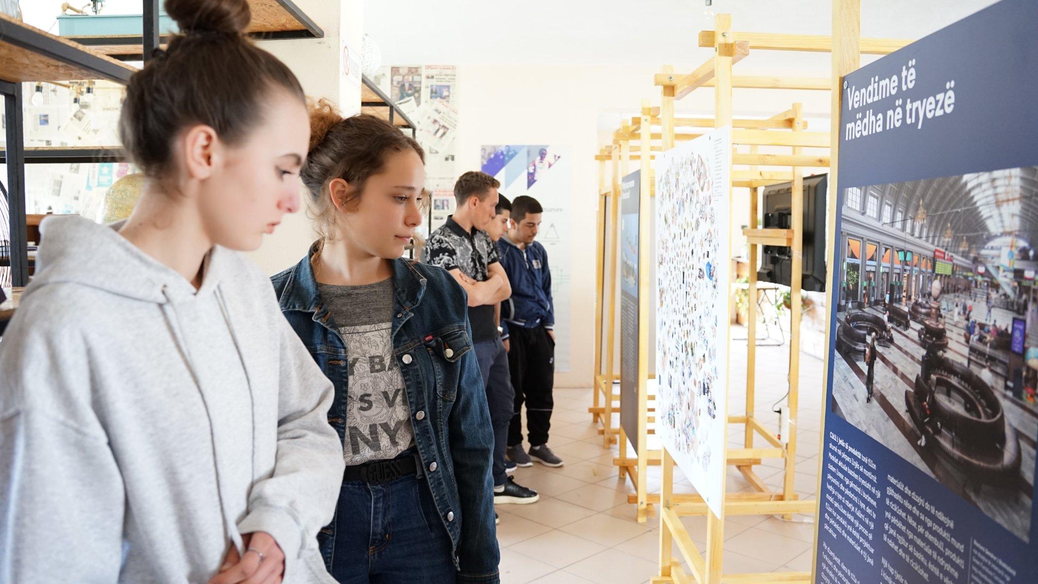 Students looking at the exhibition.