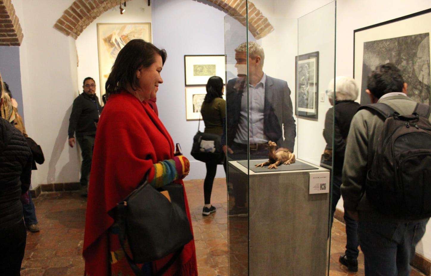 People looking at a museum exhibition.