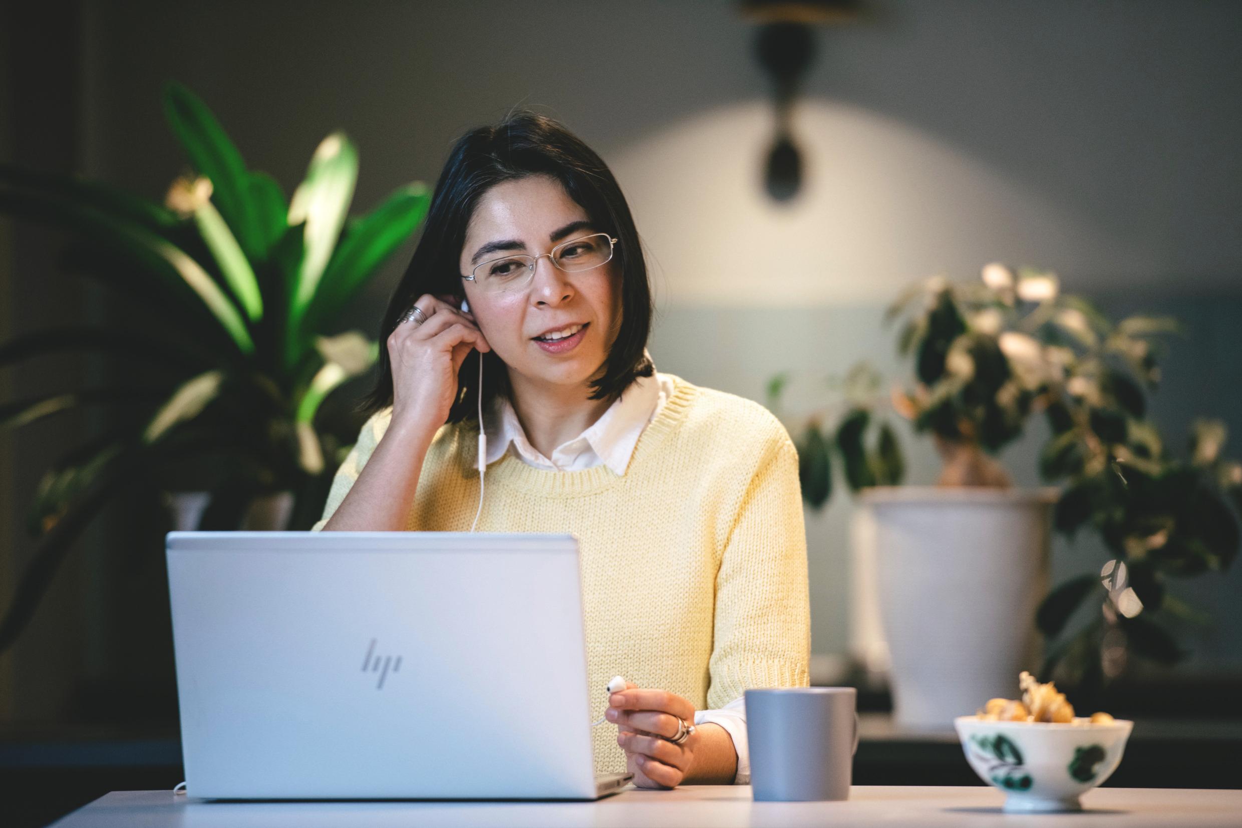 A woman working at her computer.