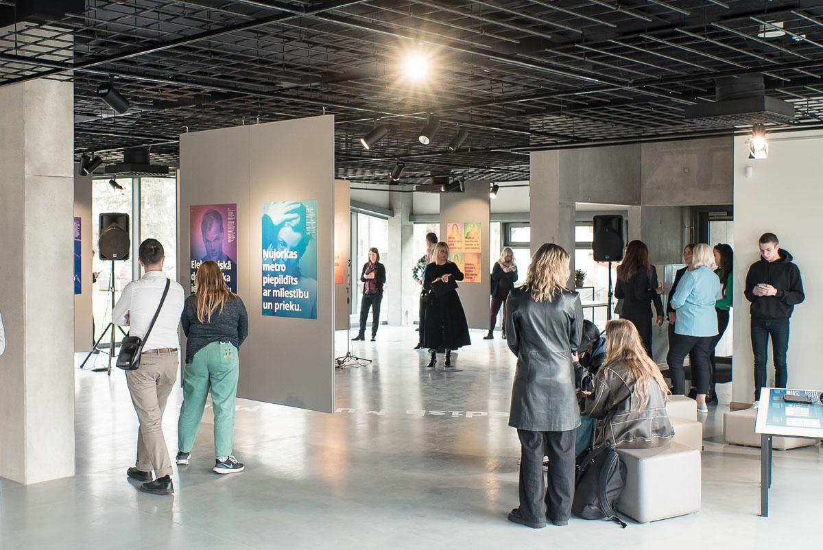 Students looking at the music exhibition.